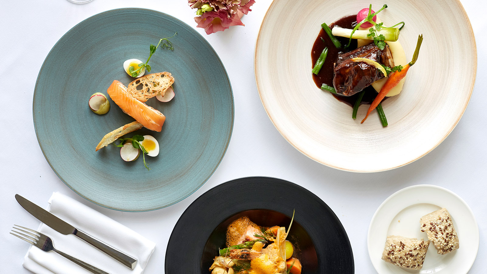 Fish and Meat dishes on the table